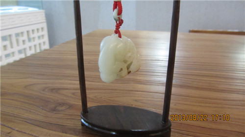 白玉籽料手把件